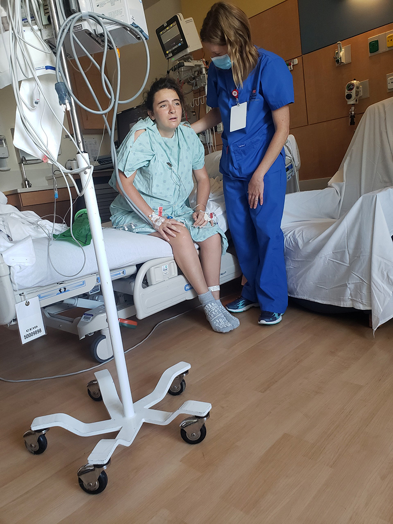 Acellyn Roach recovering in hospital bed at Riley
