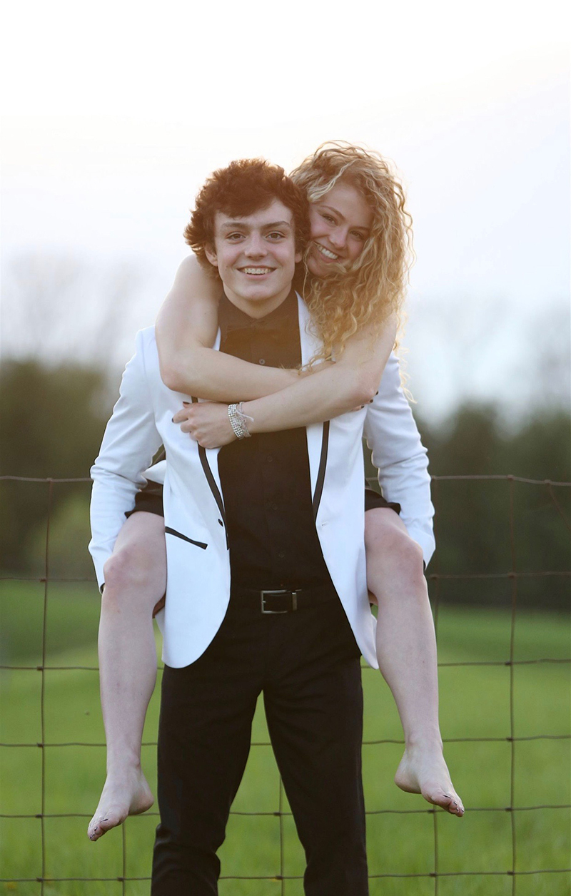 Chase and Sadie posing outside