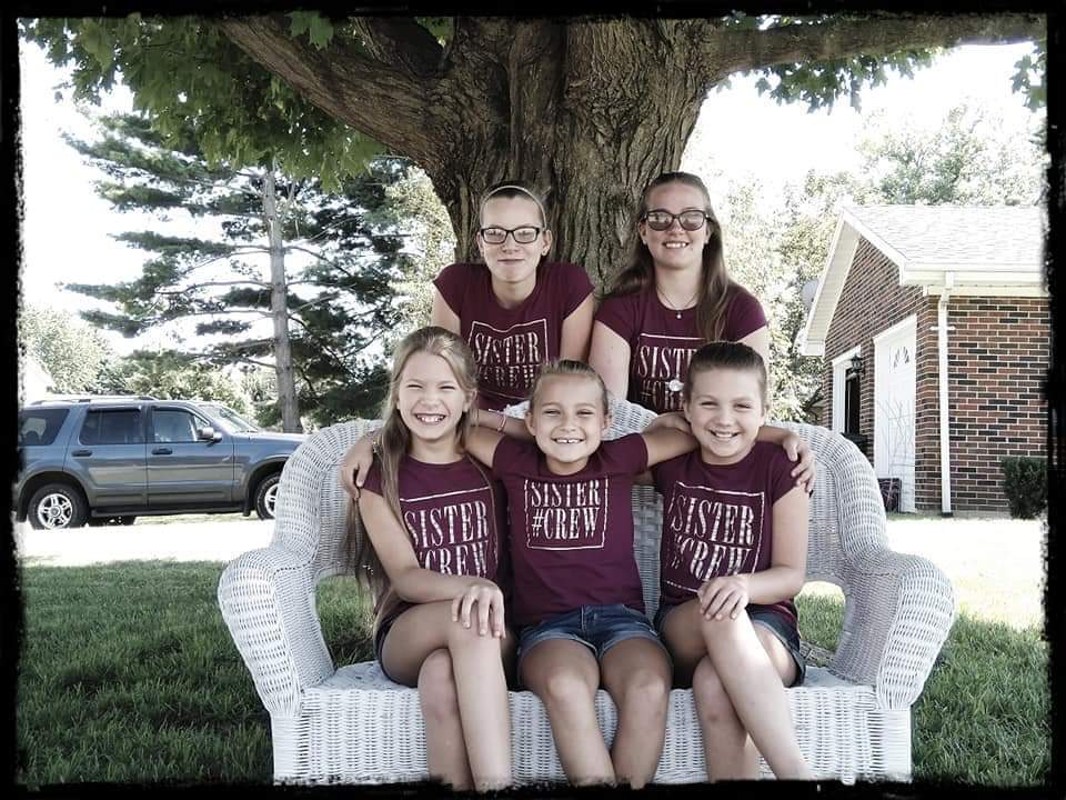Elena with her four other sisters