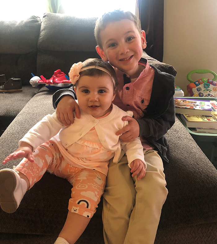 Henry holding Gertrude Grace