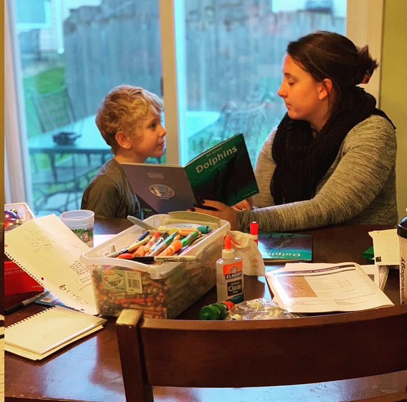 Shawn O'Connor reads to her son