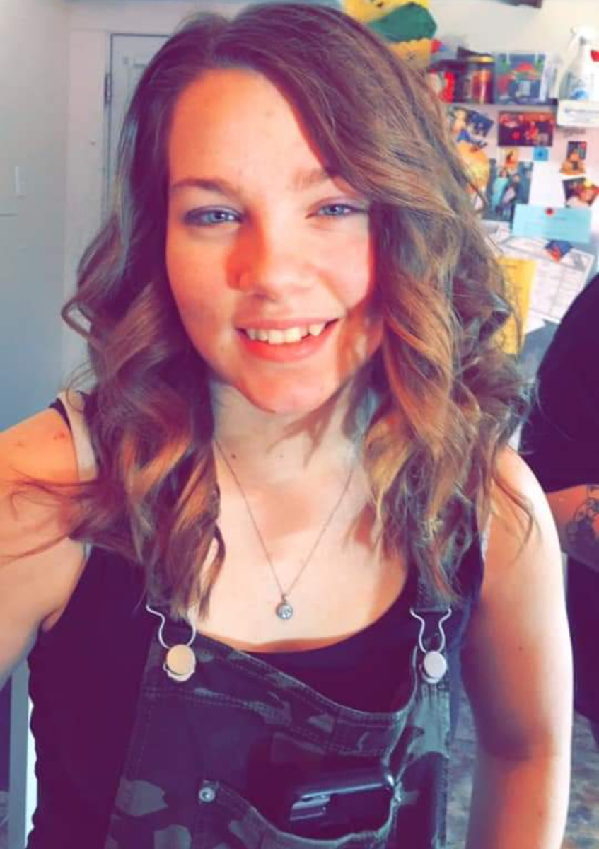 Elena Marcum smiling as she takes a selfie