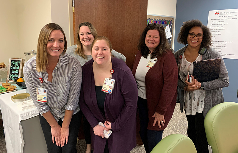 Social work team gathers together