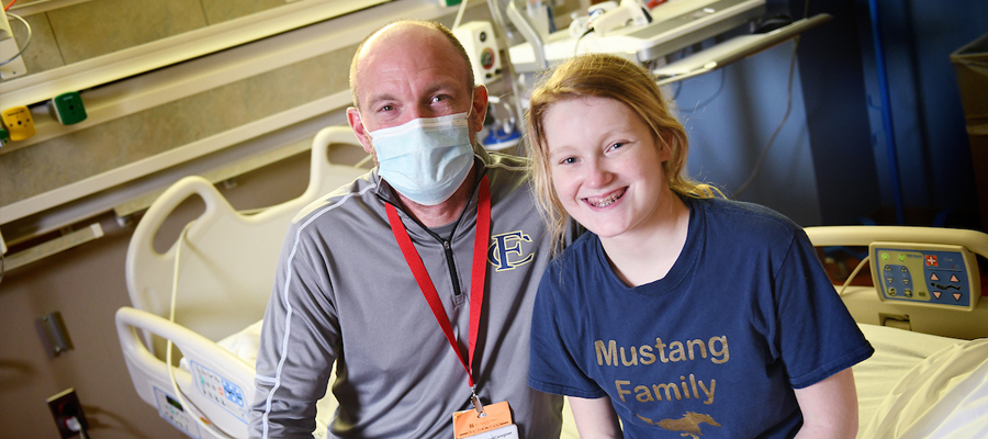 Kendall and her dad at Riley Children's Health