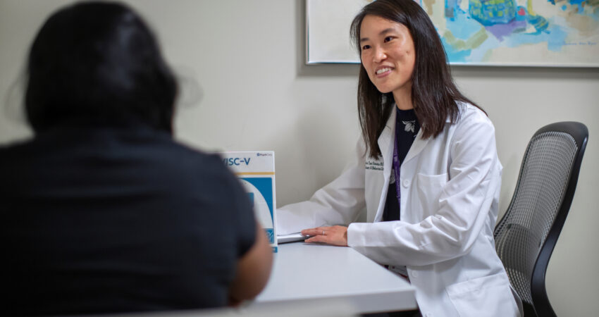 cardiologist with patient