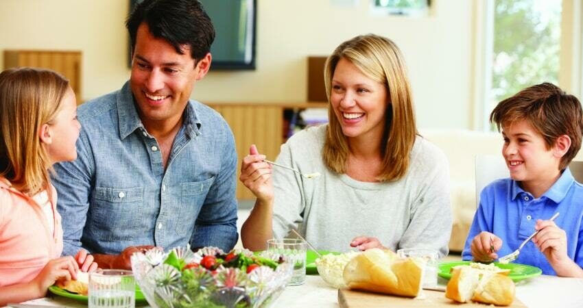 Family eating dinner min