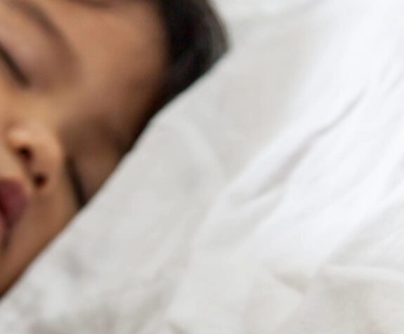 child in hospital bed