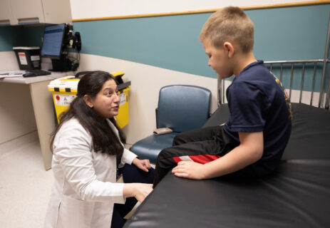 Provider evaluating patient
